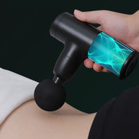 Thumbnail for Female model using the No More Sore Mini Massager And Muscle Toner on her back