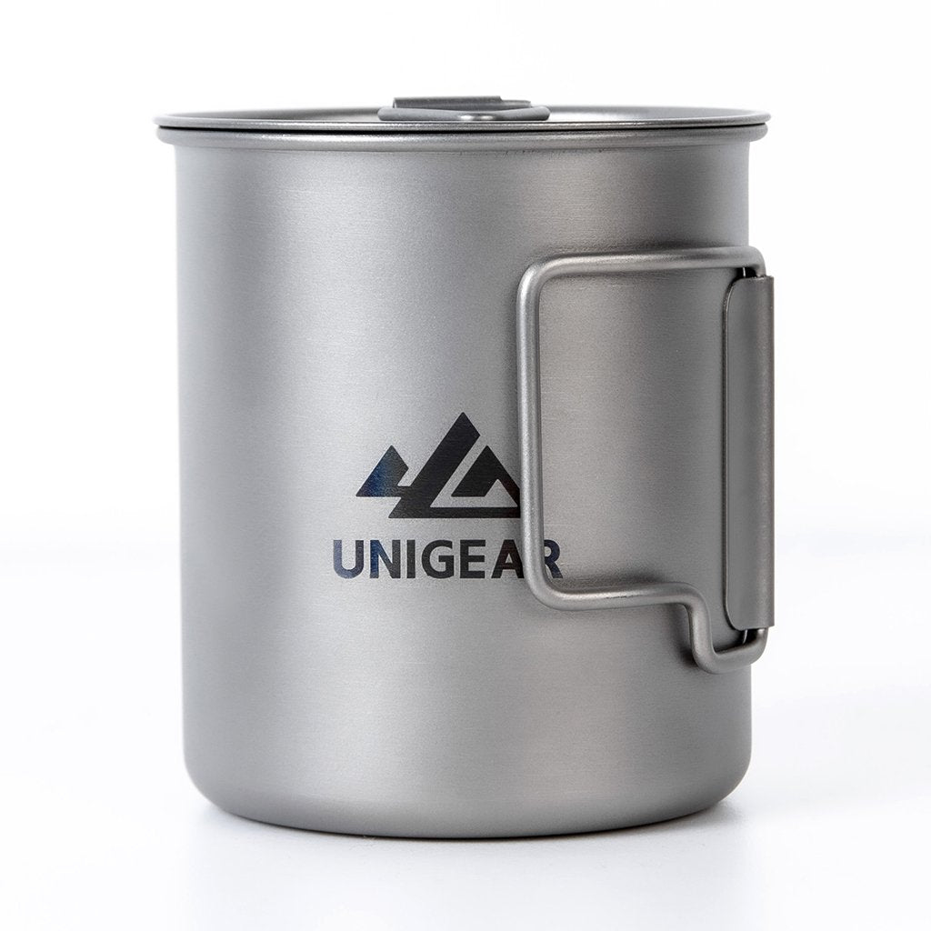 A 450ml Titanium Camping Cup shown sitting on a white table