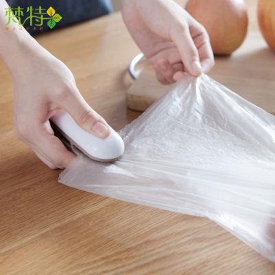 Snack Bag Open And Seal Mini Machine 2 In 1 sealing a plastic bag