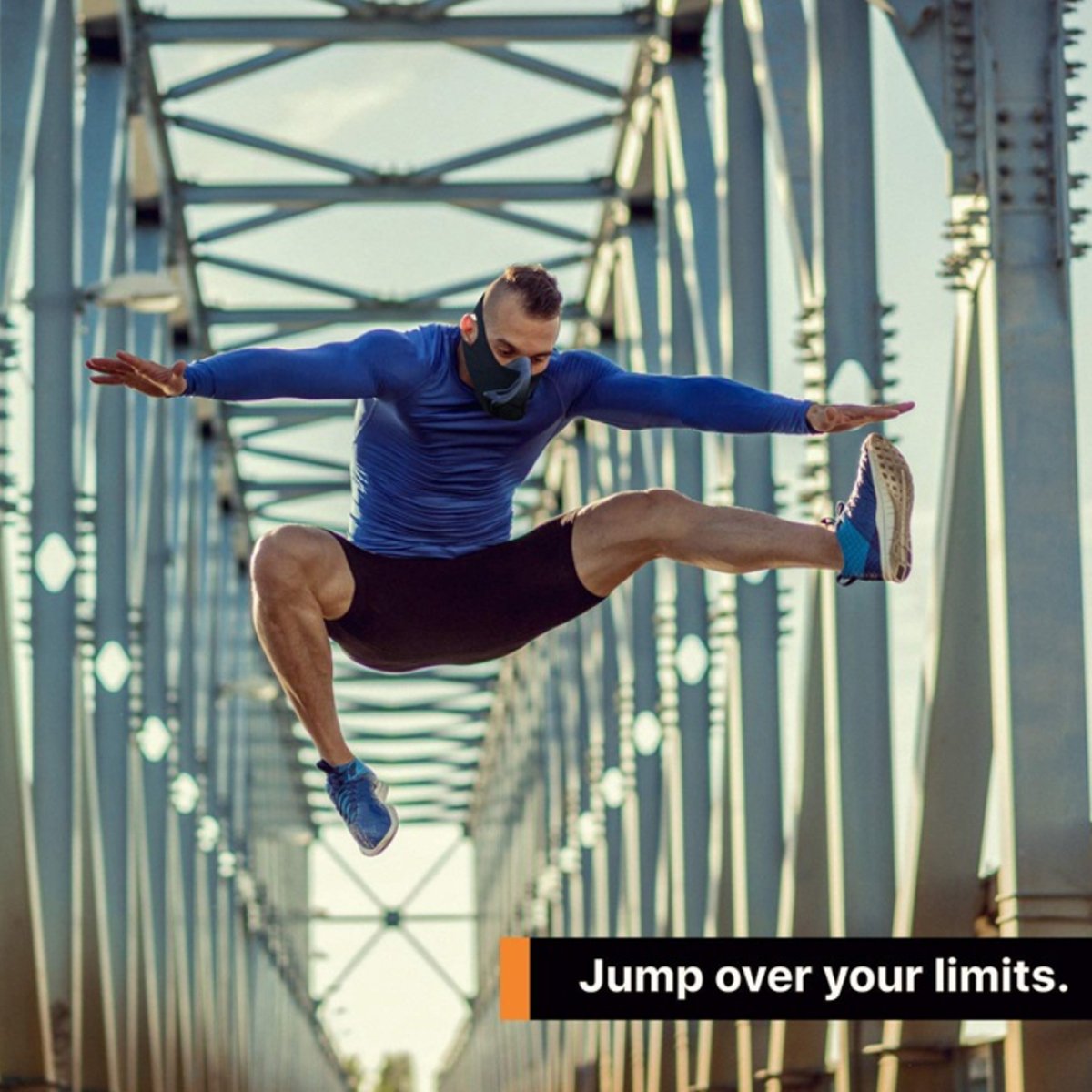 A male model jumping wearing the Premium Cardio Workout Sports Mask