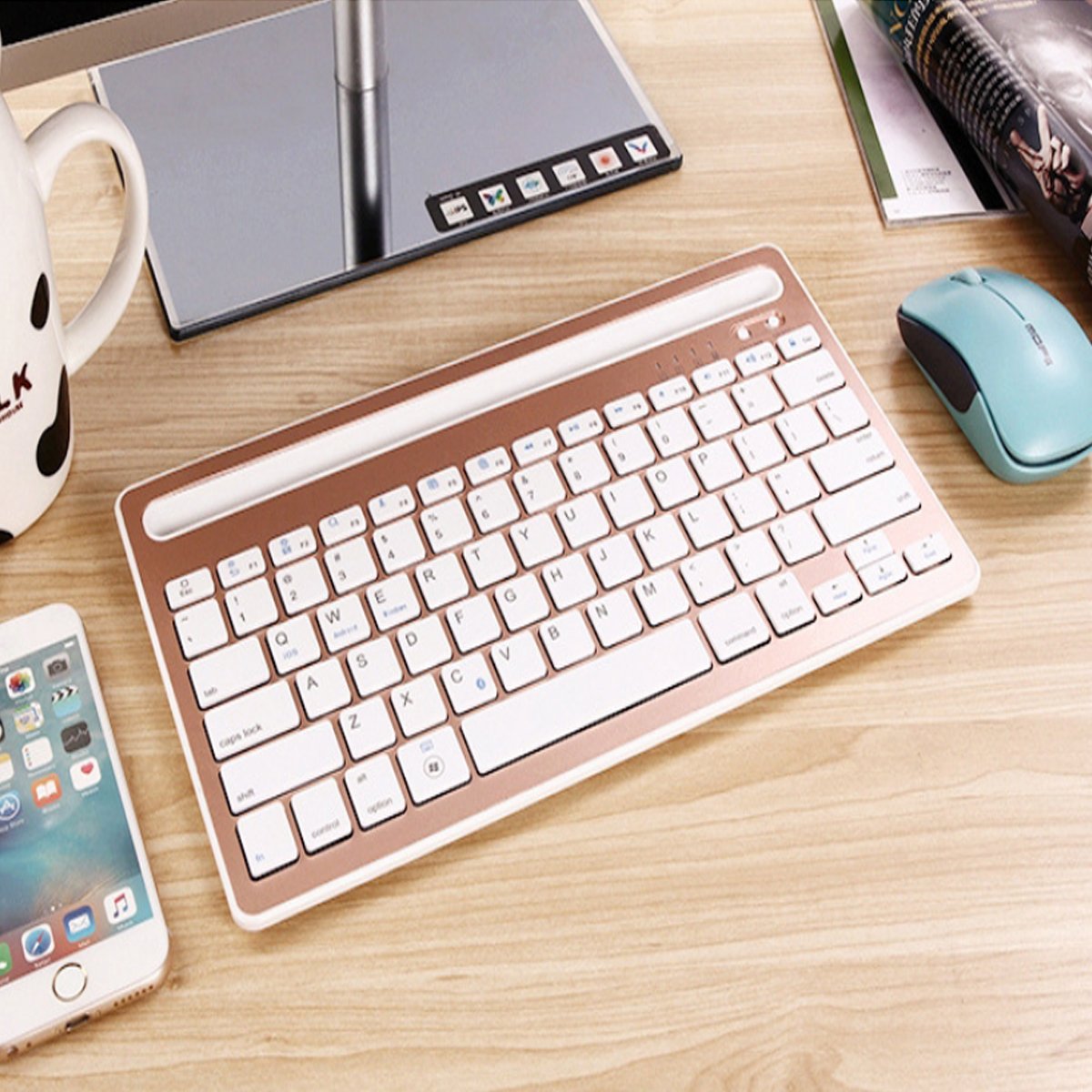 A Multi-Task Master Of All Bluetooth Keyboard shown in copper and white color