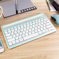 Thumbnail for A Multi-Task Master Of All Bluetooth Keyboard shown in teal green and white color