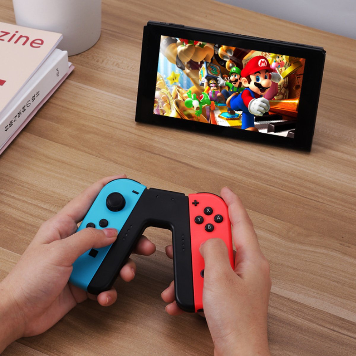 Red And Blue Switch Game Controller shown being used to play a video game