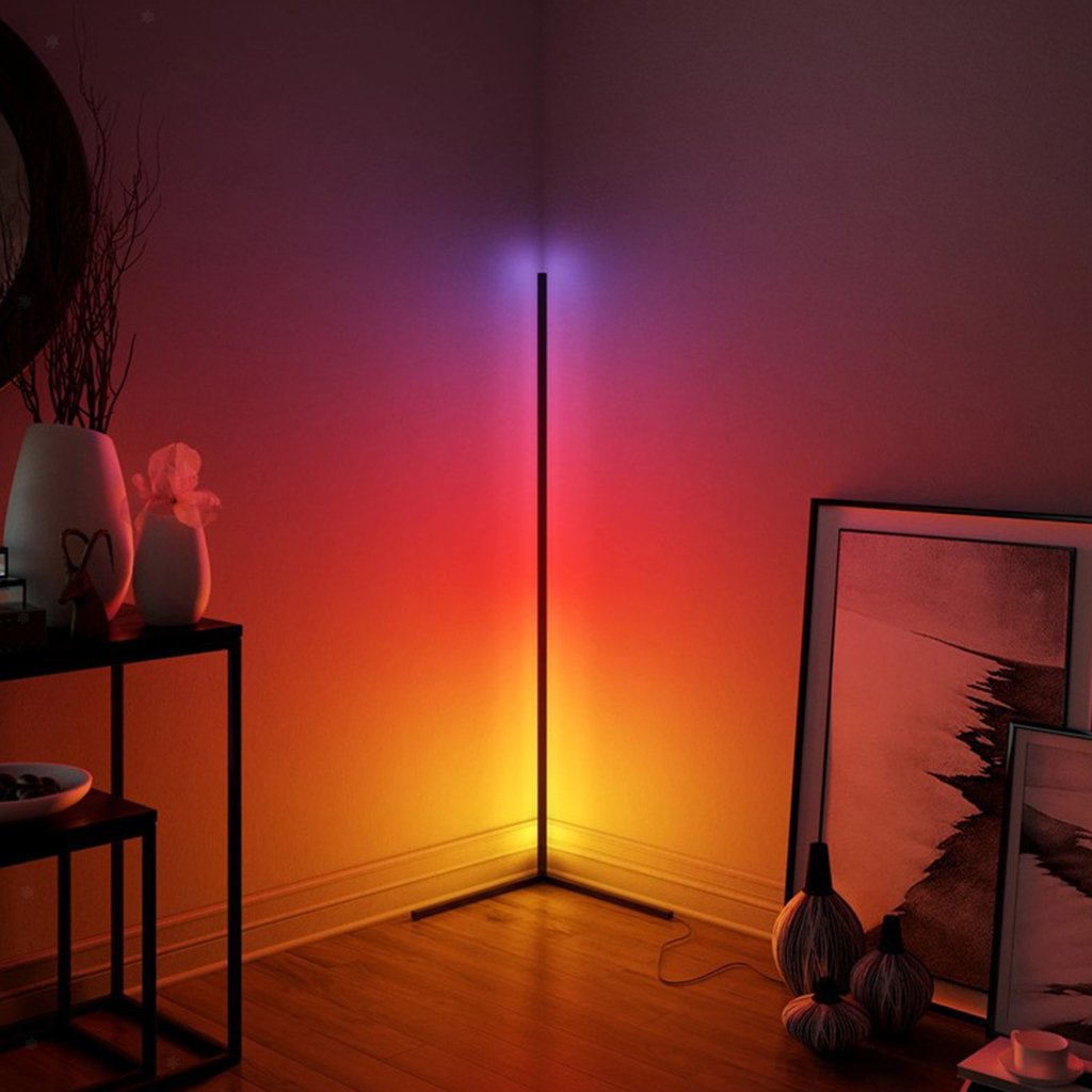 Corner Floor Lamp shown sitting in the corner of a dimly lit room with a wooden floor 