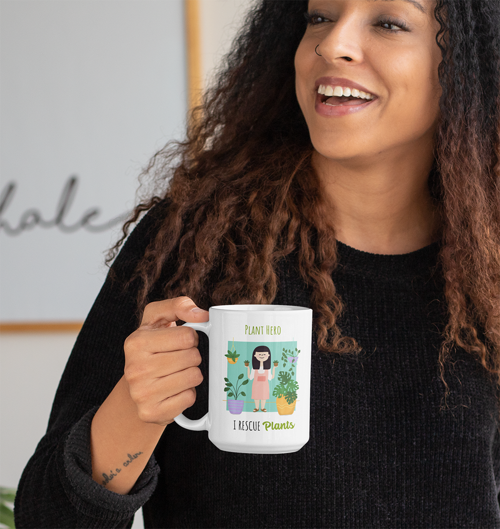 Shows a female model using the Plant Hero - I Rescue Plants Mug