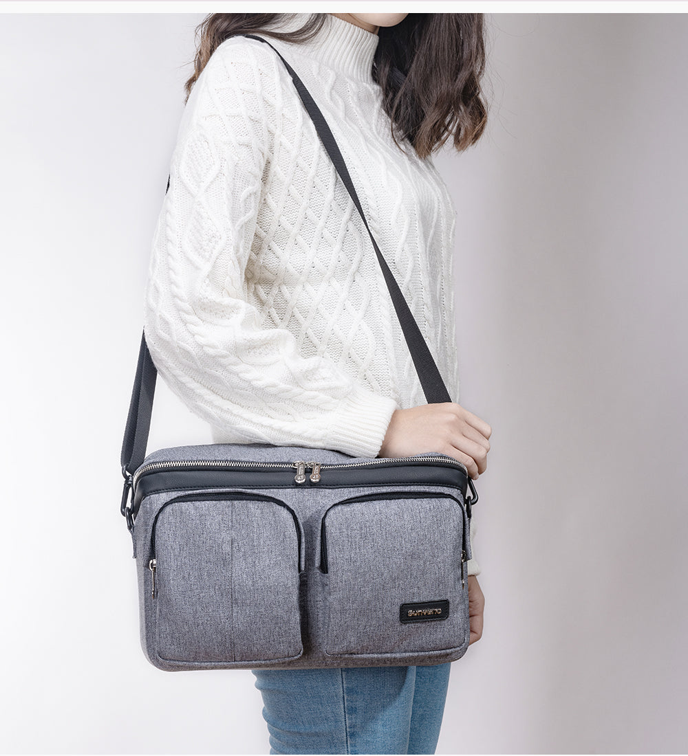 A female model using Premium Stroller Organizer/Bottle Bag