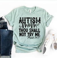 Thumbnail for Autism Mom T-shirt shown with the words Autism Mom thou Shall not try me mood 24:7 in teal green