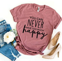 Thumbnail for A dusty rose pink You Can Never Have Too Much Happy T-shirt with a pair of blue jeans and tan heels sitting next to it