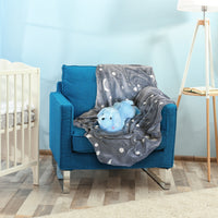 Thumbnail for Shows the Microfiber Glow in the Dark Blanket & Pillow Set sitting in a chair