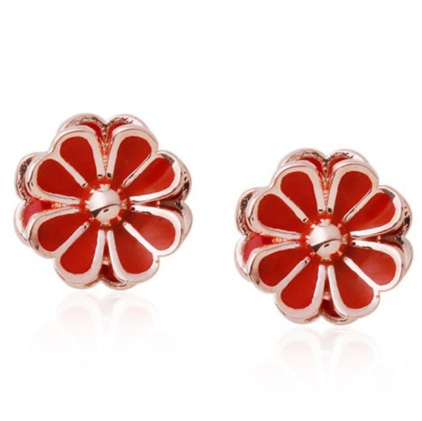 A set of Daisy Red Stud Earrings with 14K Gold Pin shown in red and gold