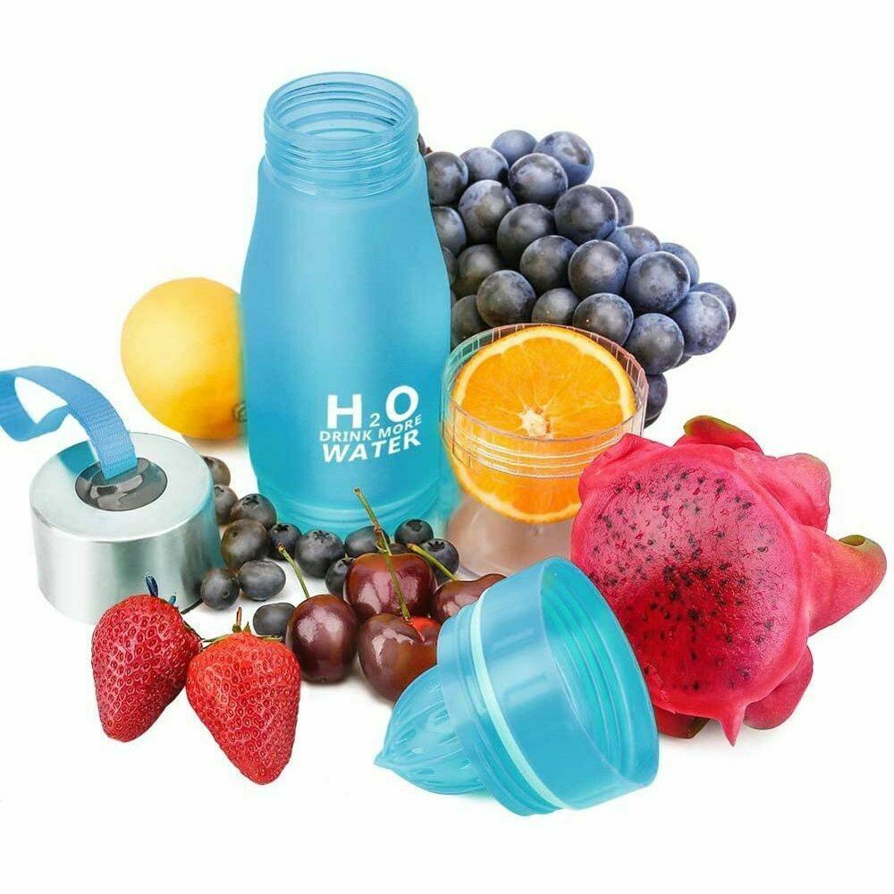 A blue infuser bottle surrounded by various fruits strawberrys blueberries lemon and cherries