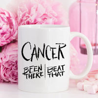 Thumbnail for A Cancer Survivor Been There Gift Mug with breast cancer awareness pink flowers sitting behind it