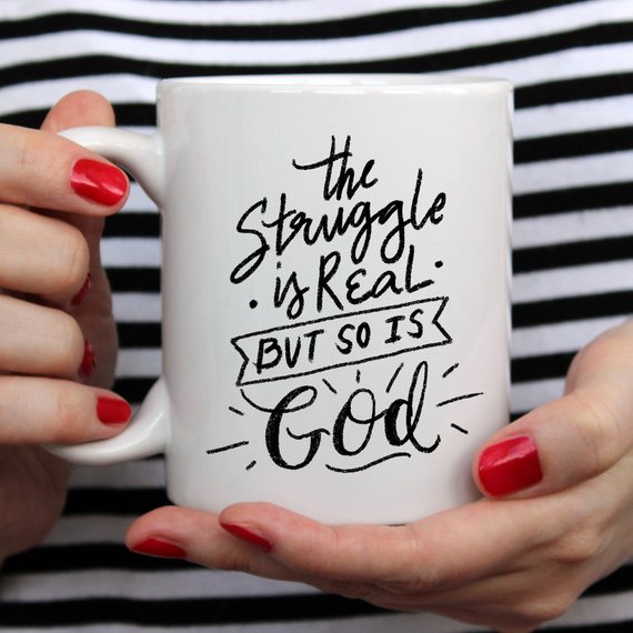 The Struggle Is Real But So Is GOD Mug, Coffee held by a female model