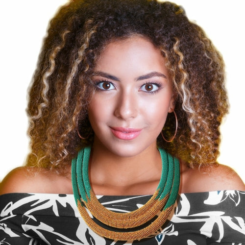 A female model shown wearing the Zulu Maasai Beaded Necklace